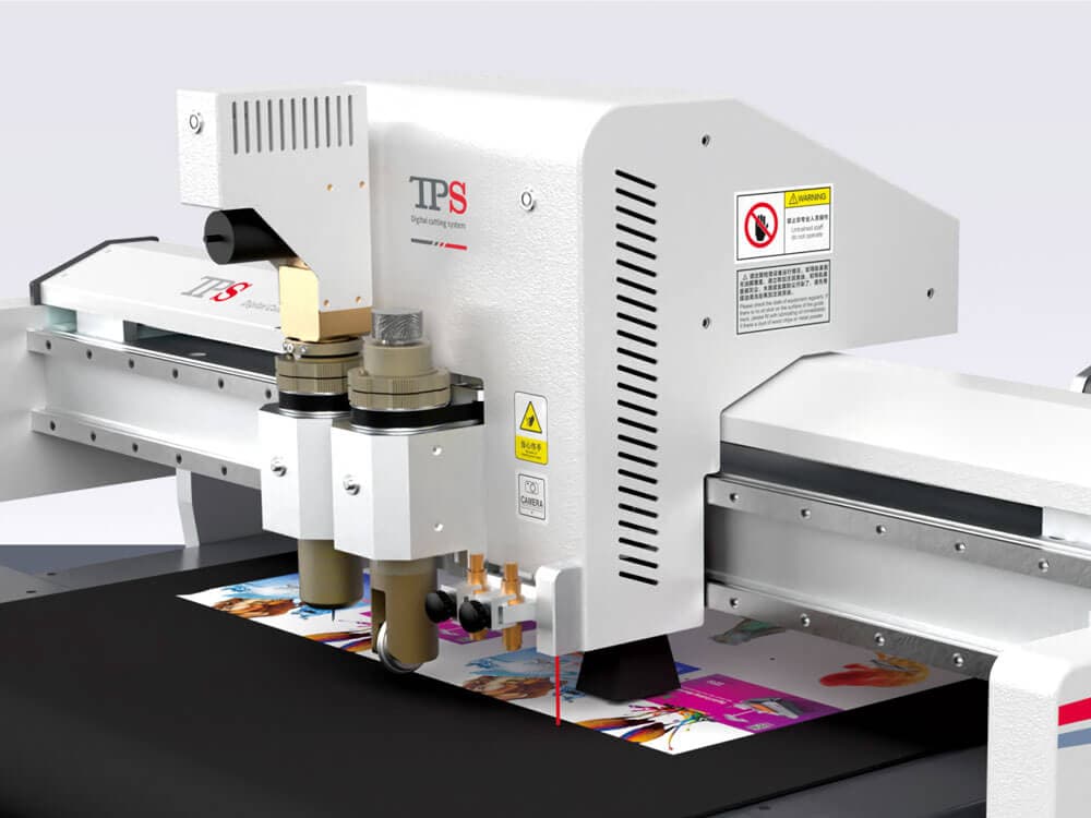 The TPS S2+ tool head over the cutting table