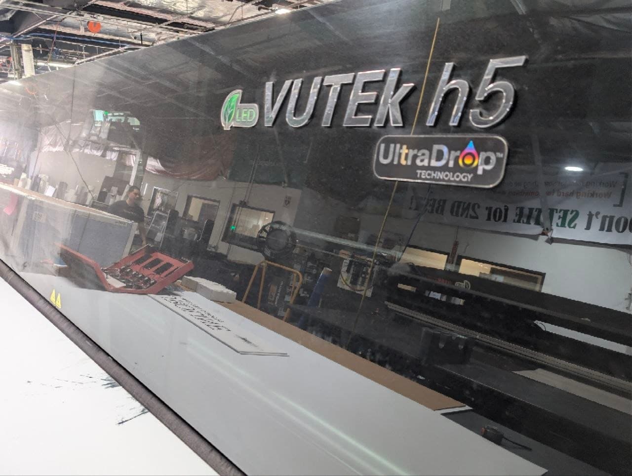 EFI VUTEk H5 in the shop, the machine name on its black side panel